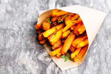 Homemade  oven baked carrot chips with thyme