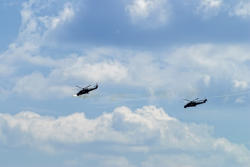 Nizhniy Tagil, Russia - July 12. 2008: Russian military helicopters mi-24 do volley by uncontrollable rockets. Russia Arms Expo-2008