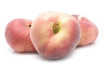 chinese flat peaches on white background