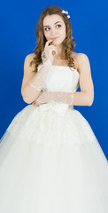 Fototapeta premium bride on blue background. dress