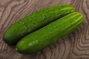 Two green cucumbers