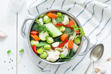 Colorful fresh clear spring soup - vegetarian stock