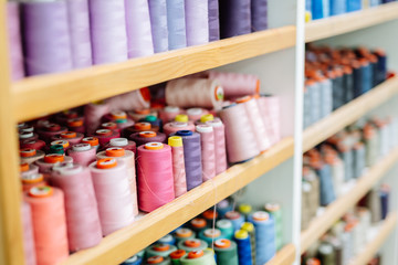 Fototapeta na wymiar Colorful thread spools used in fabric industry