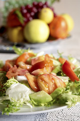 Plate of salad with various vegetables.
