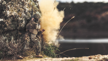 Toy that recreates a soldier covering himself with an explosion.
