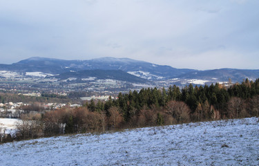 Landscape of Beskydy mountains in winter on cloudy day