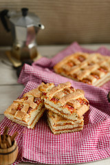 pieces of cake on a red and white napkin