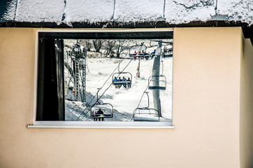 ski tow reflection in window