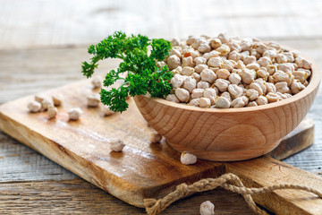 Chickpea and a sprig of parsley.