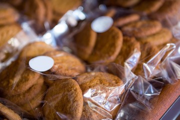 Packets of cookies on display shelf