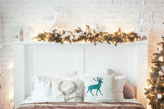 Burning Lantern And Christmas Decoration On White Background. Xmas Tree. Candleholder House. Bed With Pillow