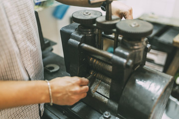 Goldsmith crafting metal