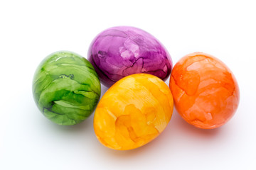 Easter eggs painted in colors on a white background.