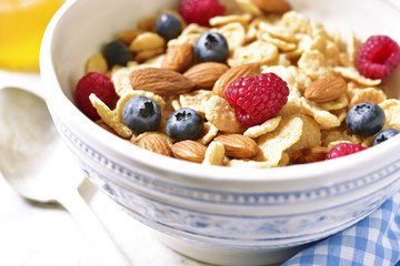 Muesli with fresh ripe berries for a breakfast.