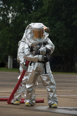 Fototapeta premium Fire departments & emergency response teams suited up with PPE
