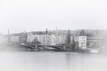 Prague, Czechia - November, 24, 2016: panorama of an old Prague, bridges and embankment of Vitava river, Czechia