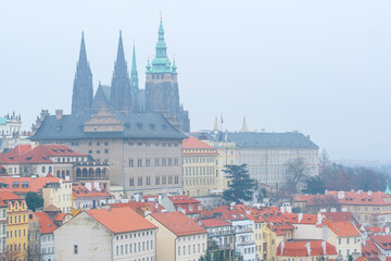 Fototapeta na wymiar Prague, Czechia - November, 24, 2016: panorama of an old Prague with St. Vitus Cathedral and Prague Castle, Czechia