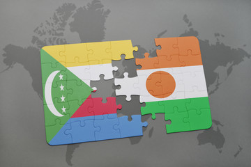 puzzle with the national flag of comoros and niger on a world map