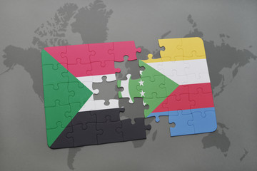 puzzle with the national flag of sudan and comoros on a world map
