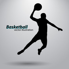 Silhouette of a basketball player.