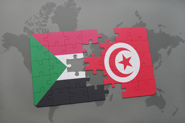 puzzle with the national flag of sudan and tunisia on a world map