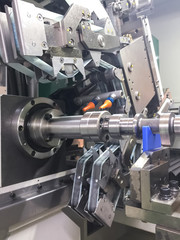 High precision CNC machining center working, operator machining