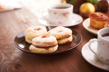 tea and sweets on a wooden table