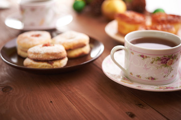 tea and sweets on a wooden table