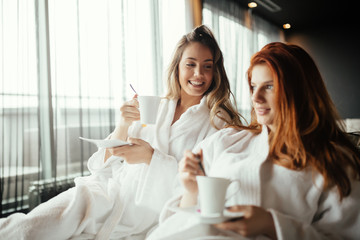 Women relaxing and drinking tea