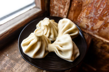 Traditional Georgian food khinkali. Minced meat with spices wrap