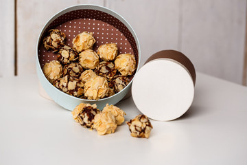 Chocolate candies over white  background.