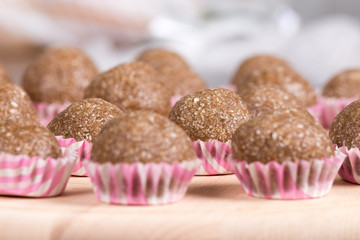 Selective focus on chocolate cupcake with coconut with shallow f