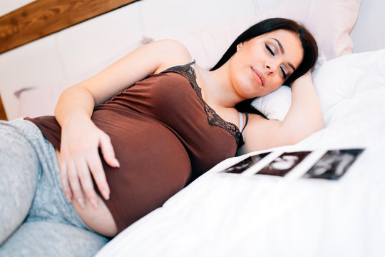 Beautiful pregnant woman resting