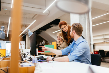 Businesspeople working in office