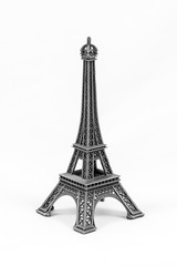 Fototapeta na wymiar Gray Eiffel Tower model, isolated on white background