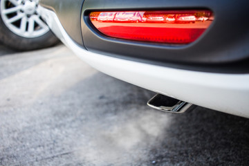 Obraz premium Pipe exhaust car smoke emission