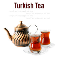 Turkish tea in traditional glasses and pot on white background