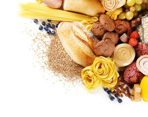 Assortment of tasty food on white background, closeup
