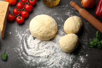 Fototapeta premium Preparation homemade pizza on kitchen table