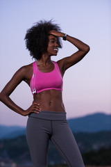 Fototapeta na wymiar portrait of african american woman jogging in nature