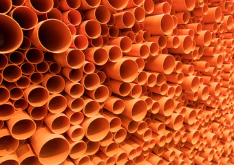 PVC pipes stacked in construction site