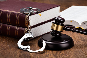 Law Equipment On Wooden Desk