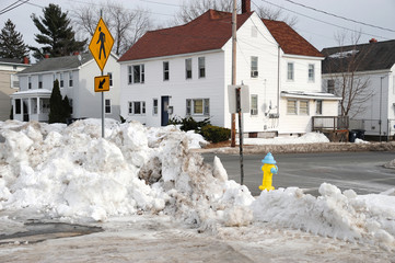 winter street scene in town after snow
