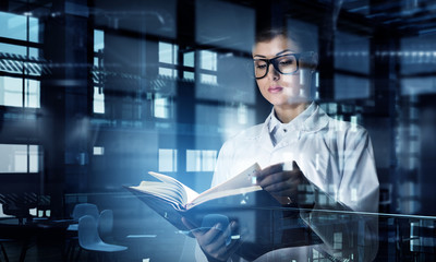 She is mastering the science . Mixed media