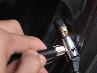 Filling air into a car tire