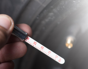 Check the tire pressure with a Tire-Pressure Gauge