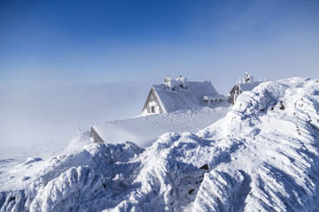 Fototapeta premium Mountain shelter on top of the hill