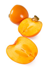 cut persimmon isolated on white
