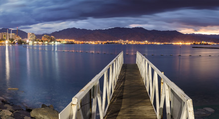 Nocturnal view on the Red Sea from central beach of Eilat - famous resort city in Israel