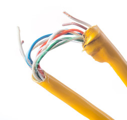 Damage to the cable network with torn wire on white background